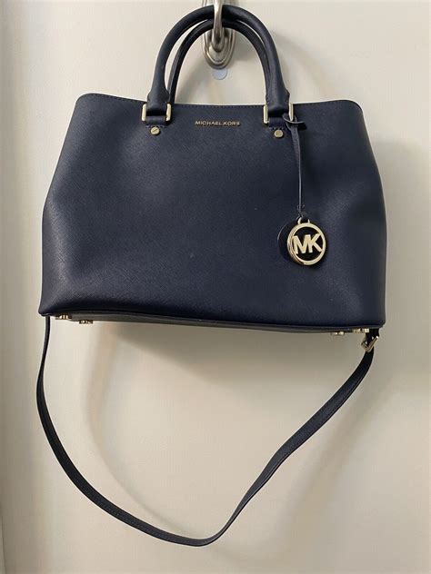 selling michael kors bag|sell used michael kors handbags.